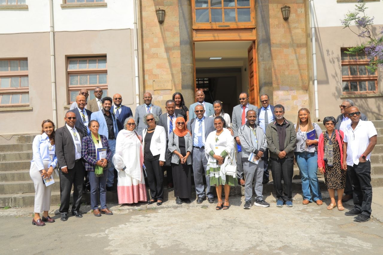 Group photo of alumni and faculty