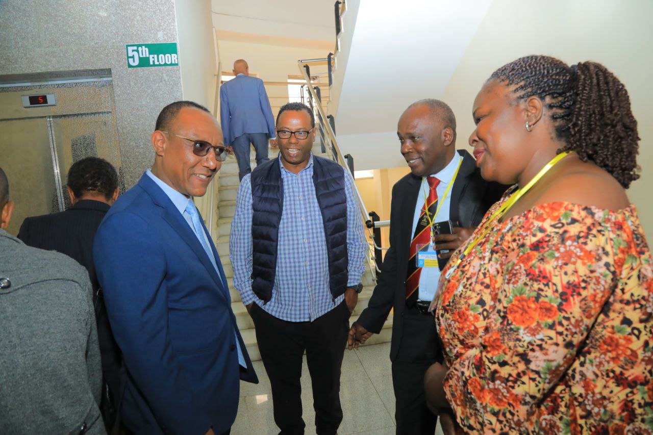Informal networking in the hallway